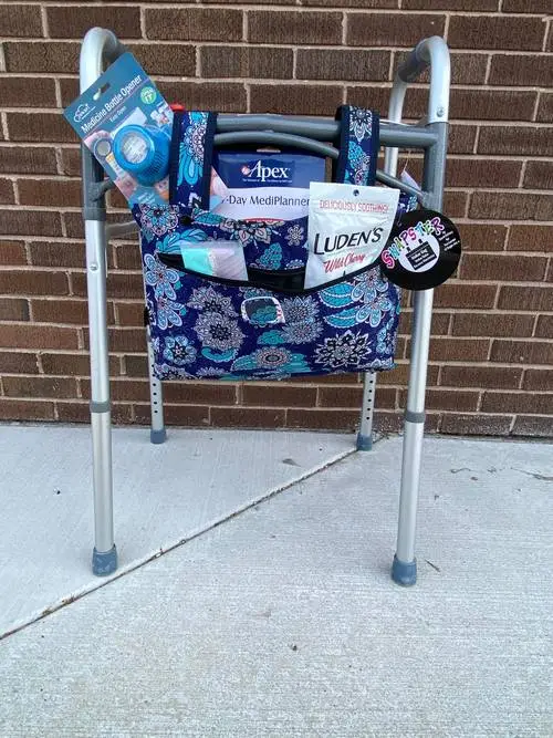 Older adult using a walker for mobility support